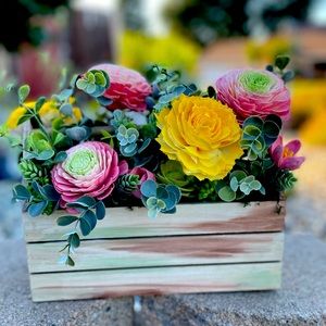 Wood tool box filled with sola wood flowers. All handmade